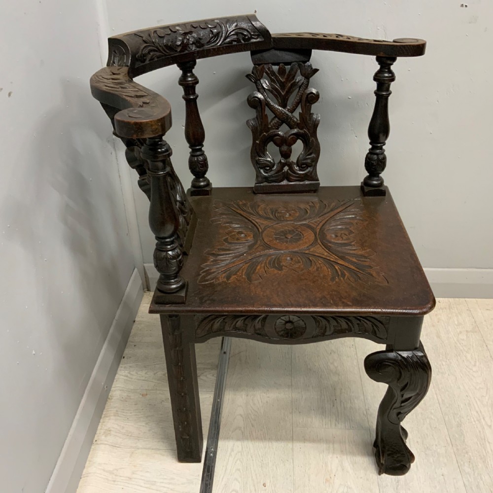 Victorian Gothic carved oak corner chair