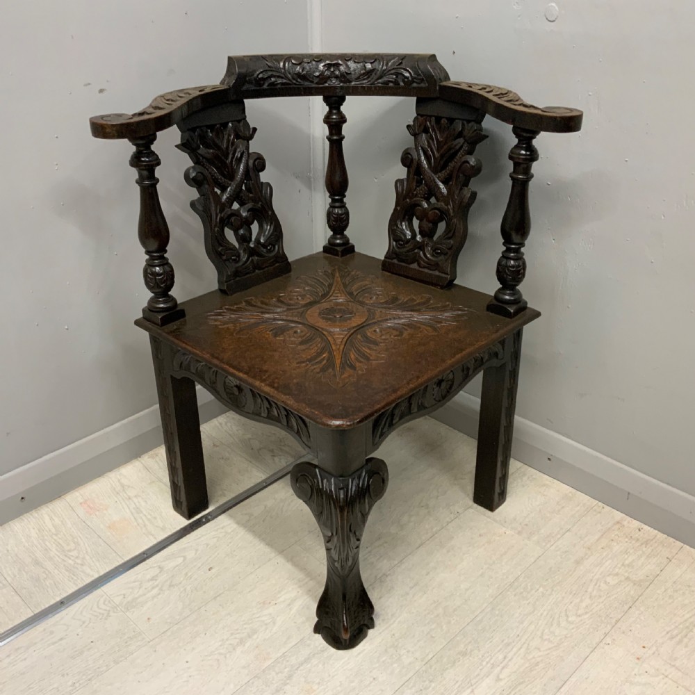 Victorian Gothic carved oak corner chair View II