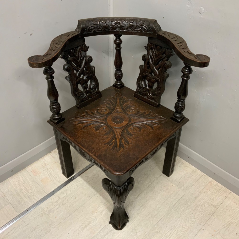 Victorian Gothic carved oak corner chair View III