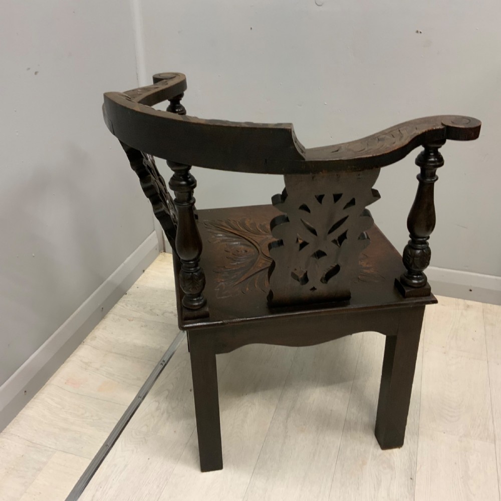 Victorian Gothic carved oak corner chair View IV