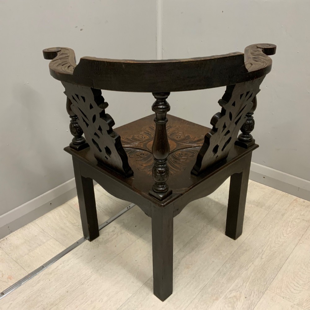 Victorian Gothic carved oak corner chair View VI