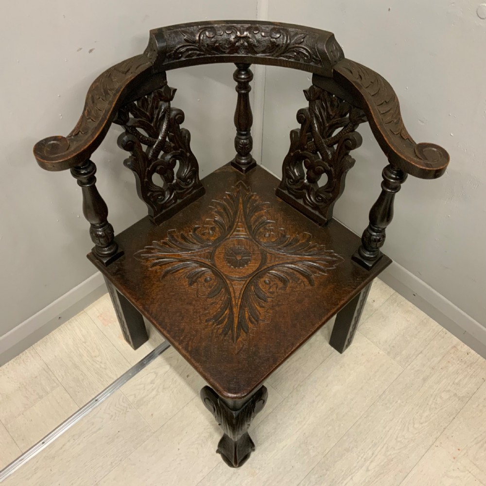 Victorian Gothic carved oak corner chair View VII