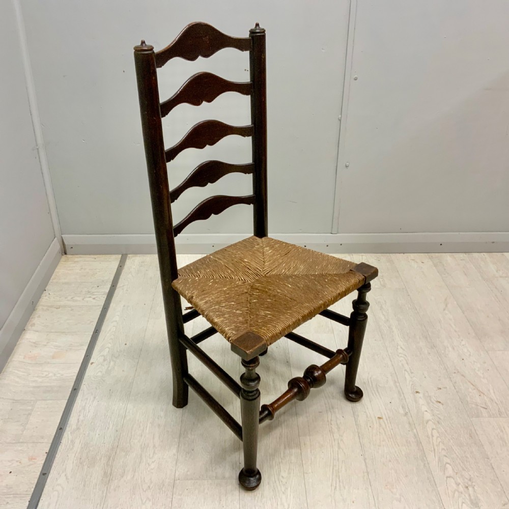 Set of 4 oak ladder back chairs View IV