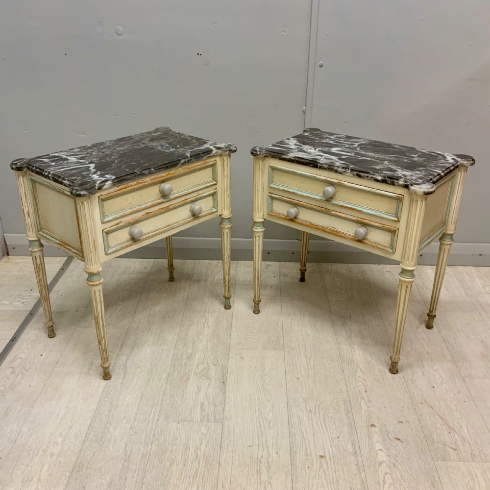 Pair of French marble top bedside tables