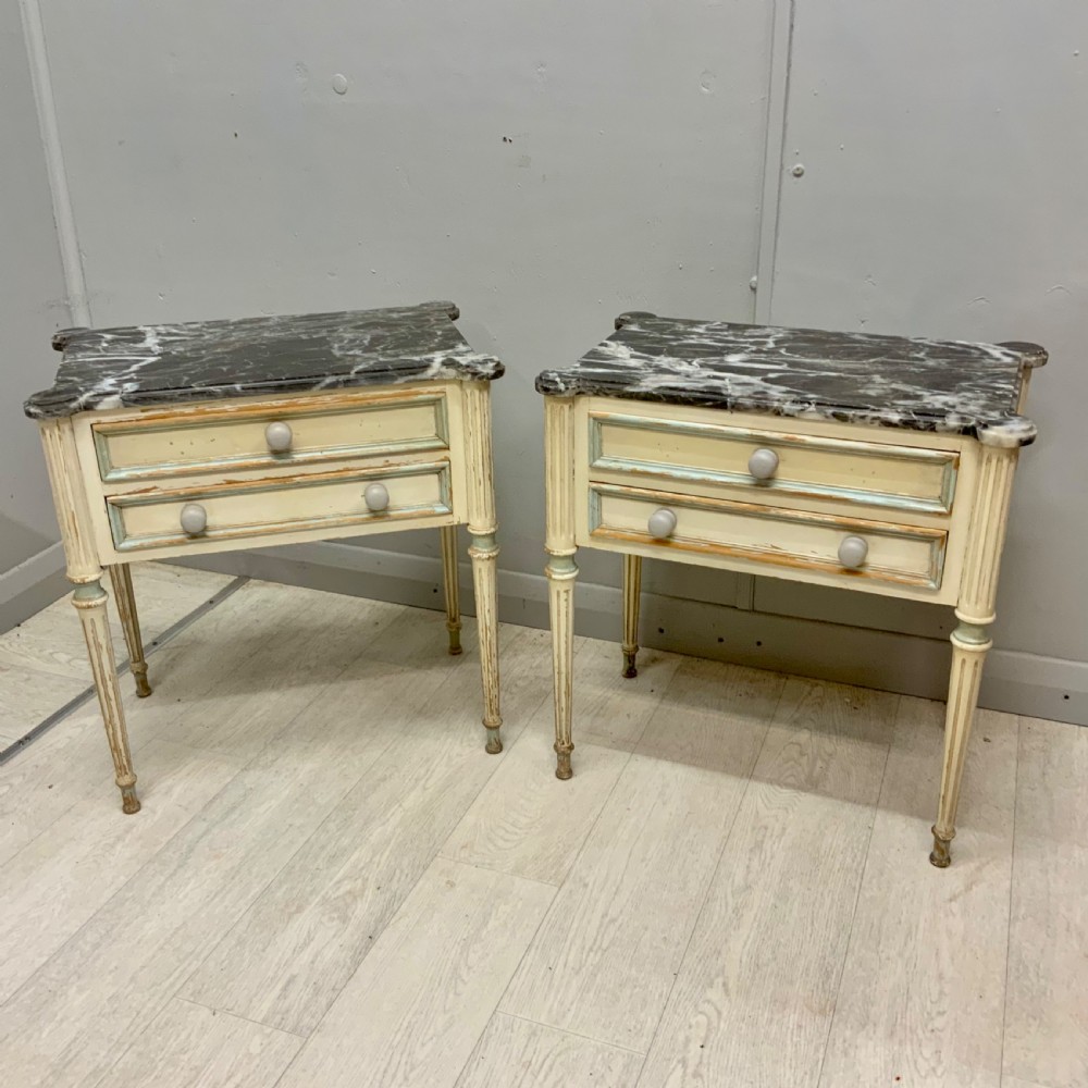 Pair of French marble top bedside tables View V