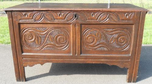 ANTIQUE CARVED OAK BLANKET CHEST