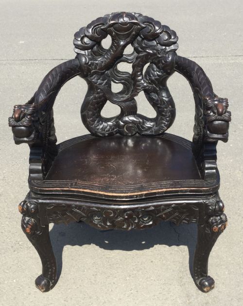 ORIENTAL CARVED HARDWOOD ARMCHAIR