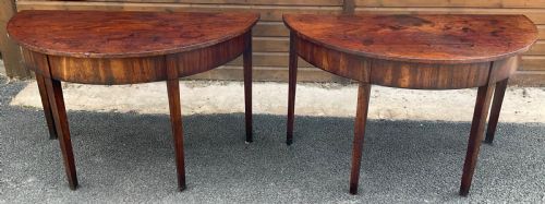 PAIR OF GEORGIAN MAHOGANY DEND CONSOLE TABLES