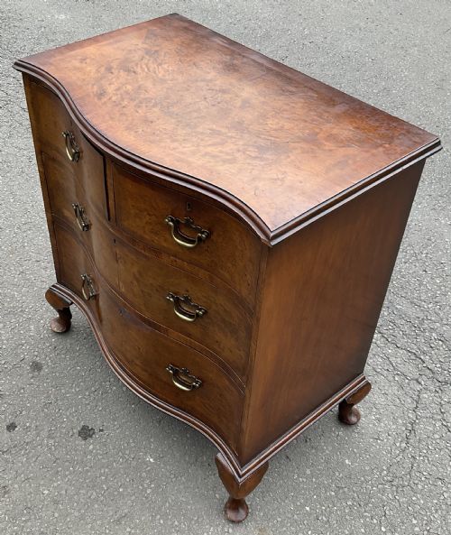 WALNUT SERPENTINE CHEST OF DRAWERS - ADDITIONAL PHOTO 1