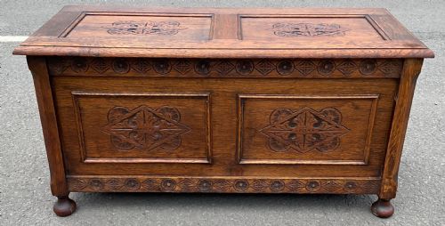 CARVED OAK PANELLED BLANKET CHEST