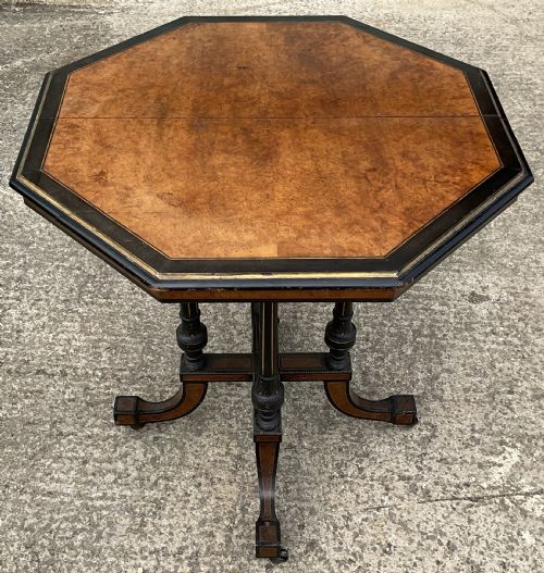 OCTAGONAL EBONIZED PEDESTAL CENTRE TABLE