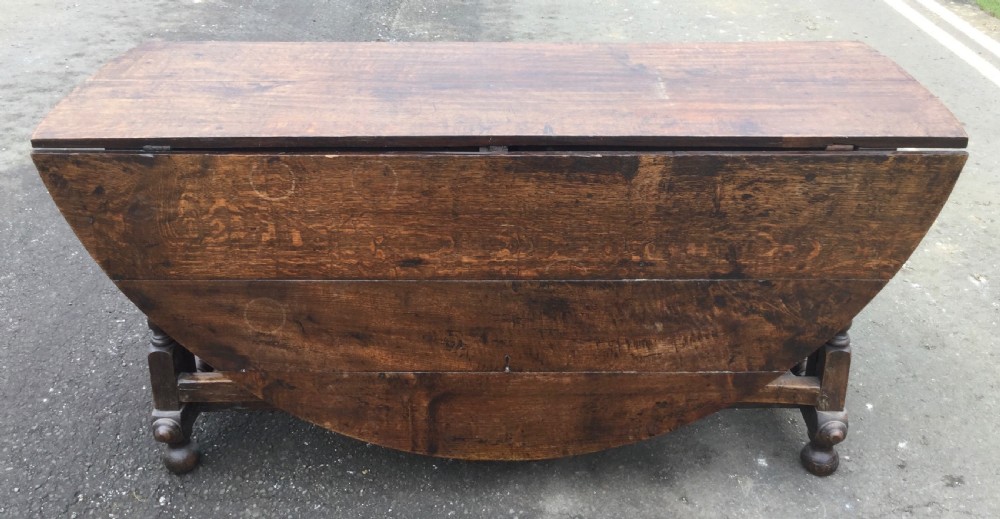 Georgian Oak Circular Top Double Gateleg Dining Table