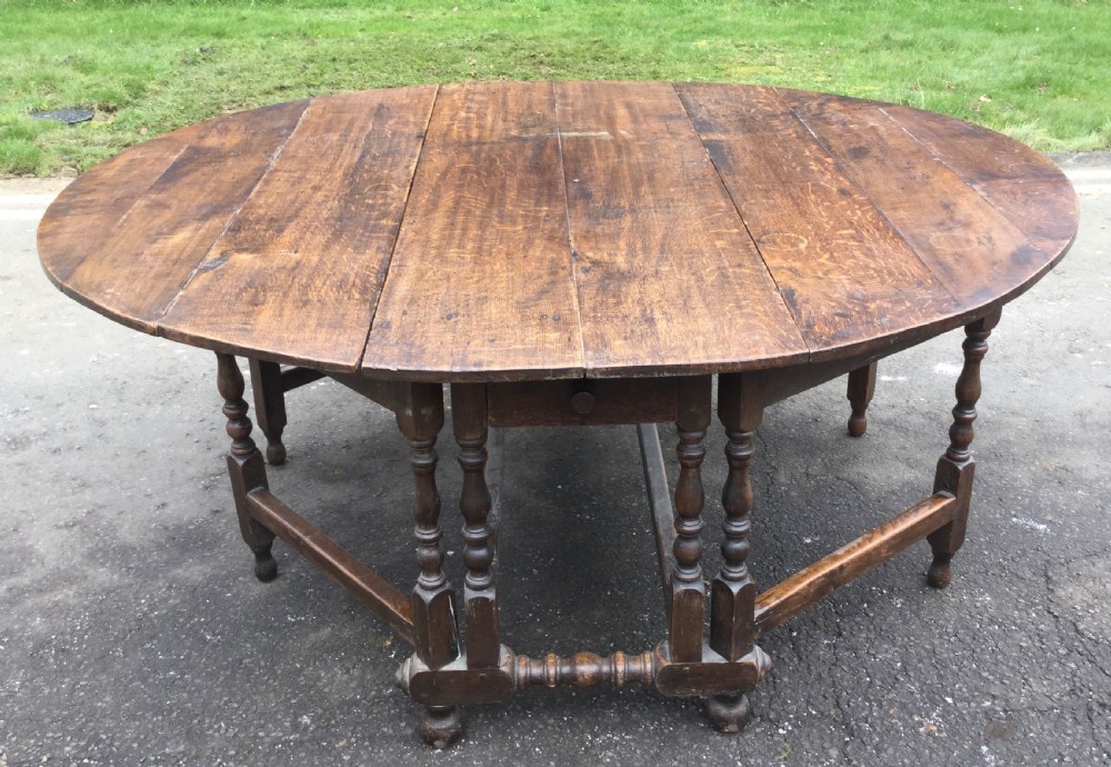 Georgian Oak Circular Top Double Gateleg Dining Table View IX