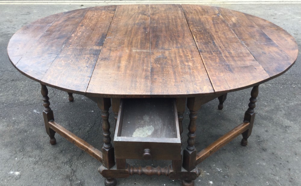 Georgian Oak Circular Top Double Gateleg Dining Table View XII
