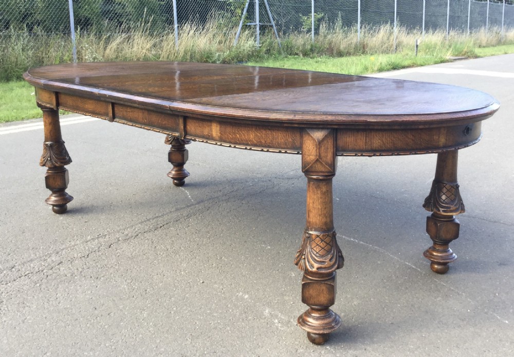 Oval Oak Extending Dining Table to Seat Ten View XI