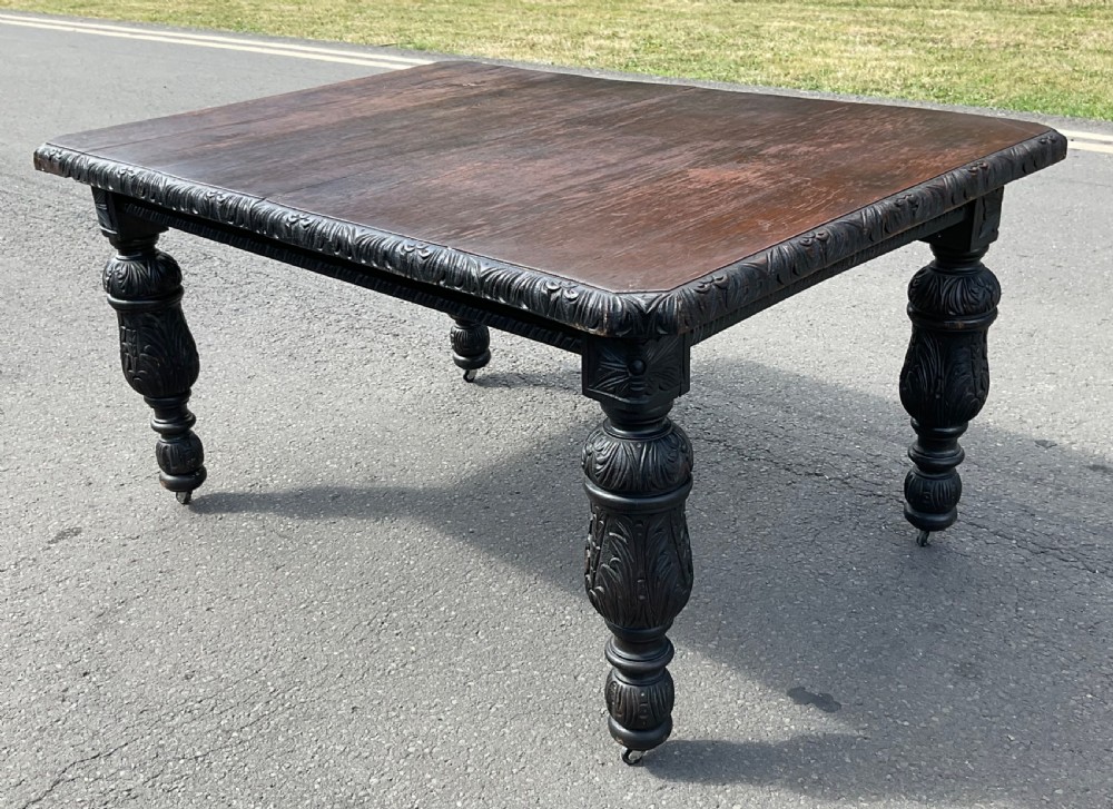 Victorian Carved Dark Oak Extending Dining Table to Seat Ten  View IV