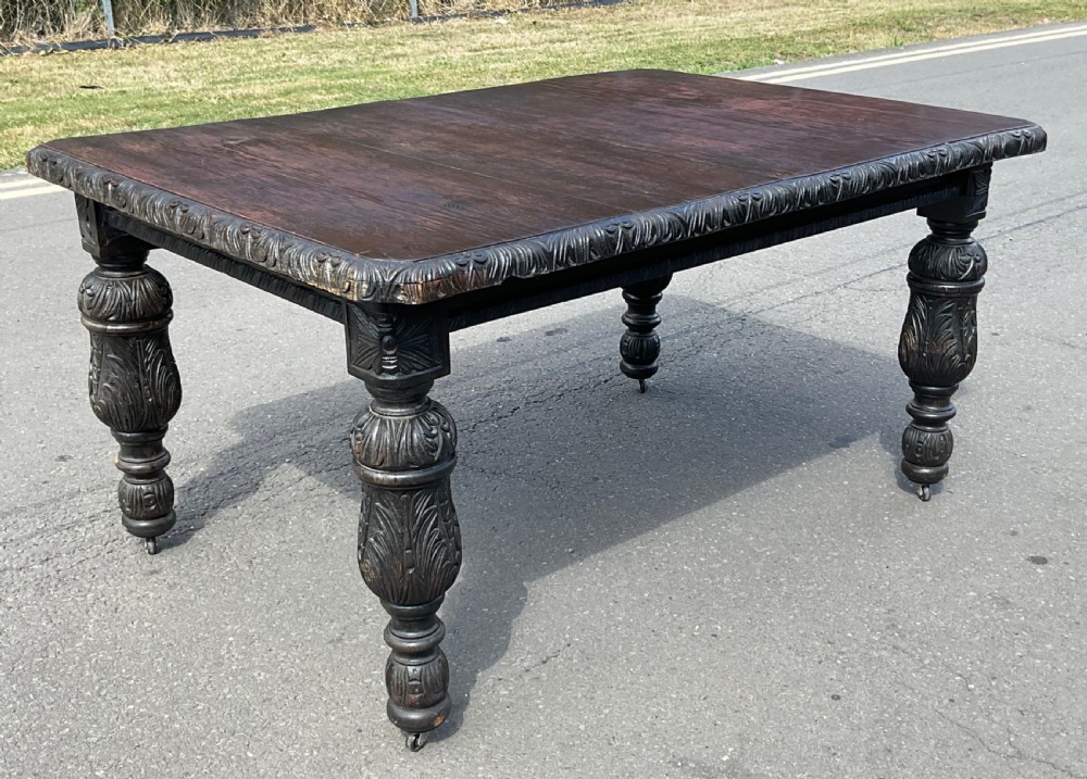 Victorian Carved Dark Oak Extending Dining Table to Seat Ten  View VI