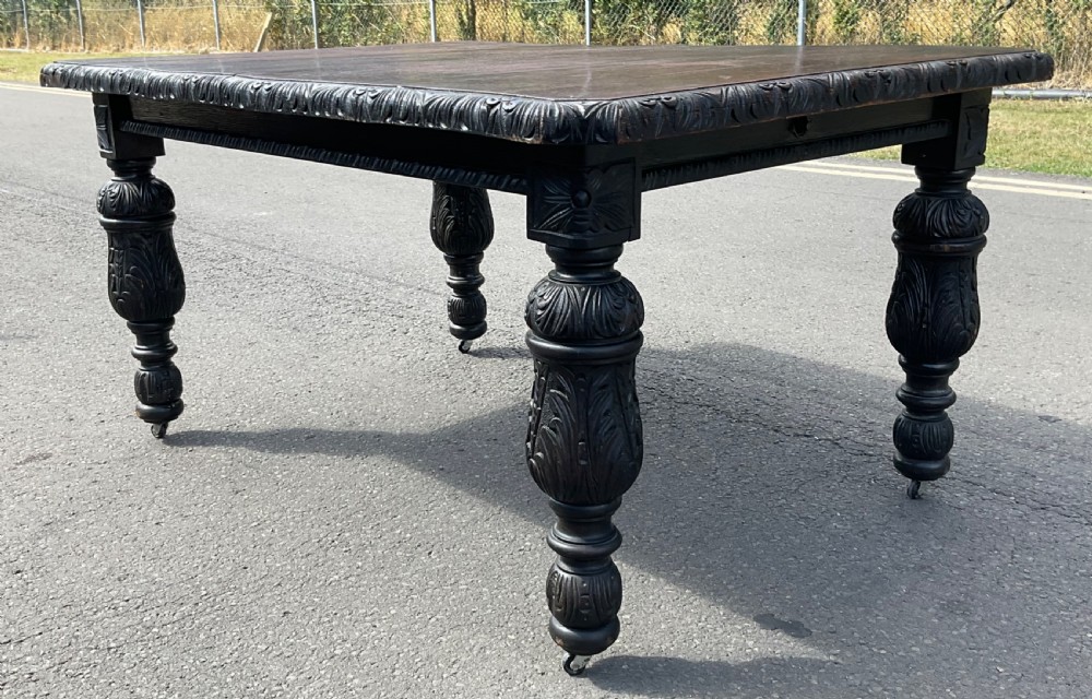 Victorian Carved Dark Oak Extending Dining Table to Seat Ten  View VII