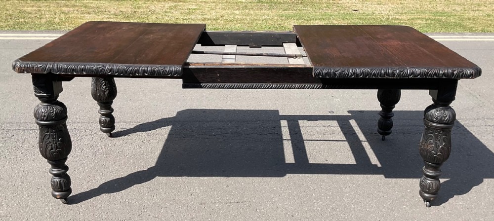 Victorian Carved Dark Oak Extending Dining Table to Seat Ten  View IX
