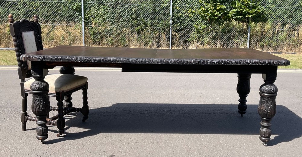 Victorian Carved Dark Oak Extending Dining Table to Seat Ten  View XIII