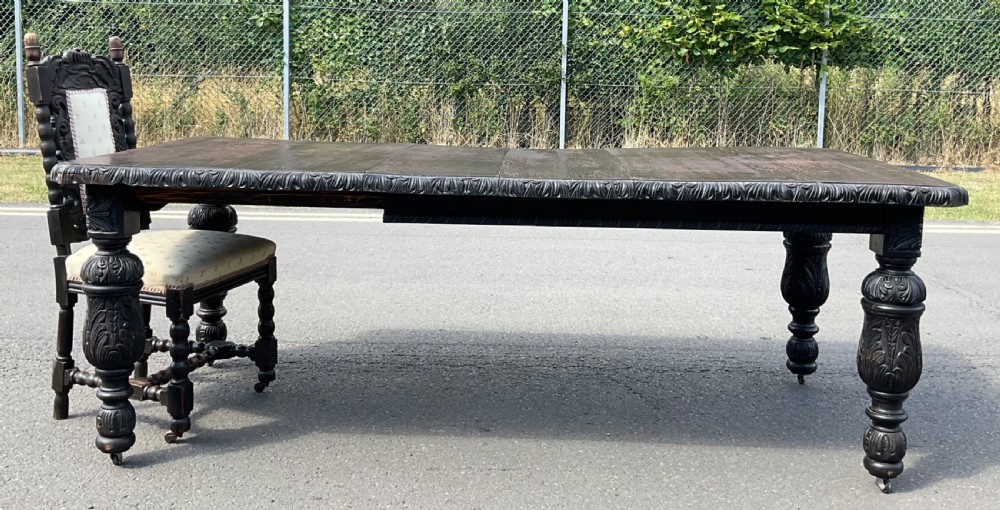 Victorian Carved Dark Oak Extending Dining Table to Seat Ten  View XIV