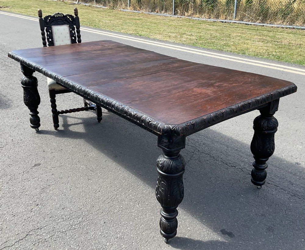 Victorian Carved Dark Oak Extending Dining Table to Seat Ten  View XV