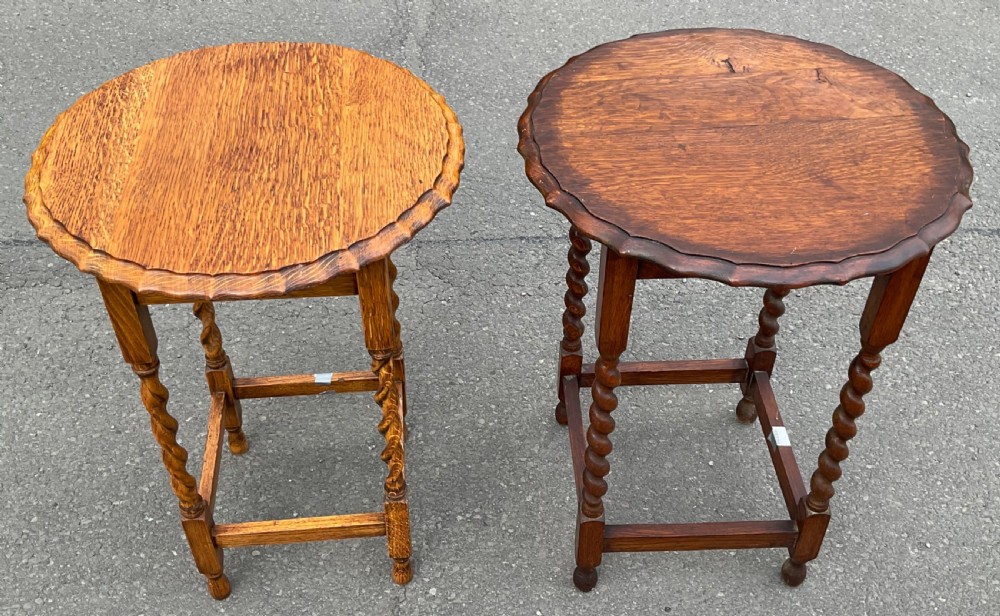 A pair of round oak side tables featuring piecrust scalloped edges, barley twist legs, and square perimeter stretchers. View III