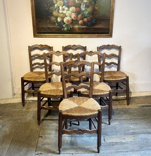 A Set of Six French Rush Seated Ladderback Chairs