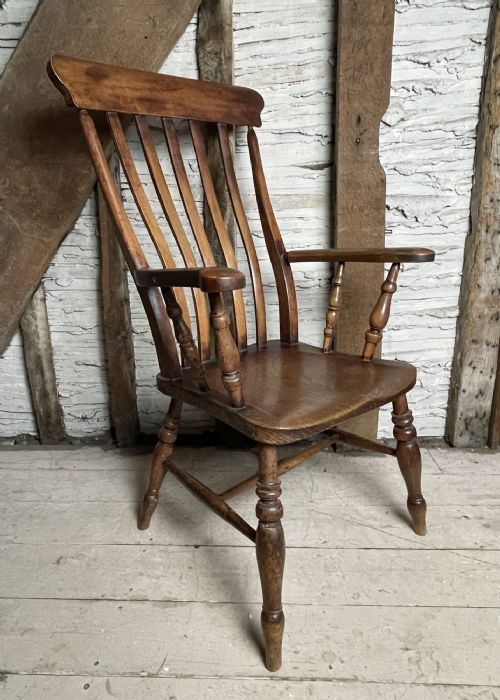A Victorian Ash and Elm Latheback Windsor Armchair

