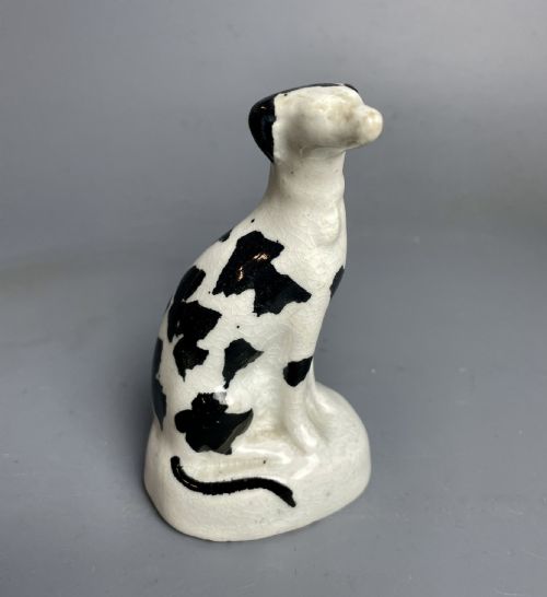 Victorian Miniature Staffordshire Model of a Seated Hound