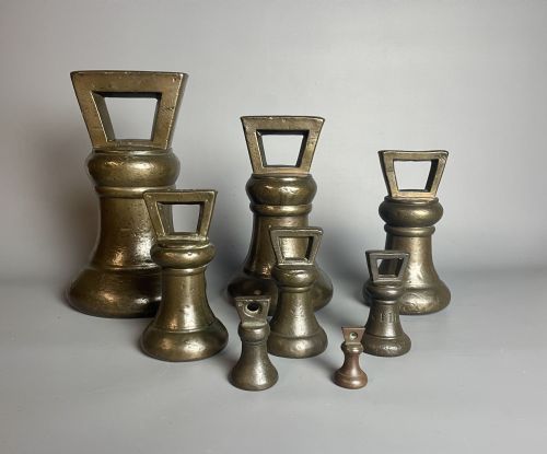 Set of 8 Georgian Bell Shaped Bronze Trade Weights 1826