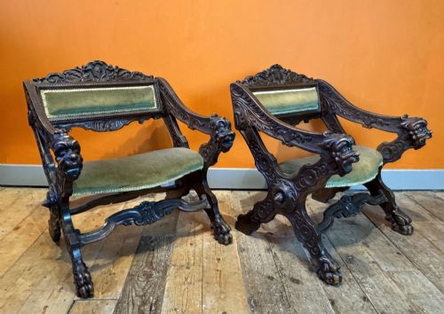 Unusual Pair of Continental Renaissance Style Carved Walnut Armchairs