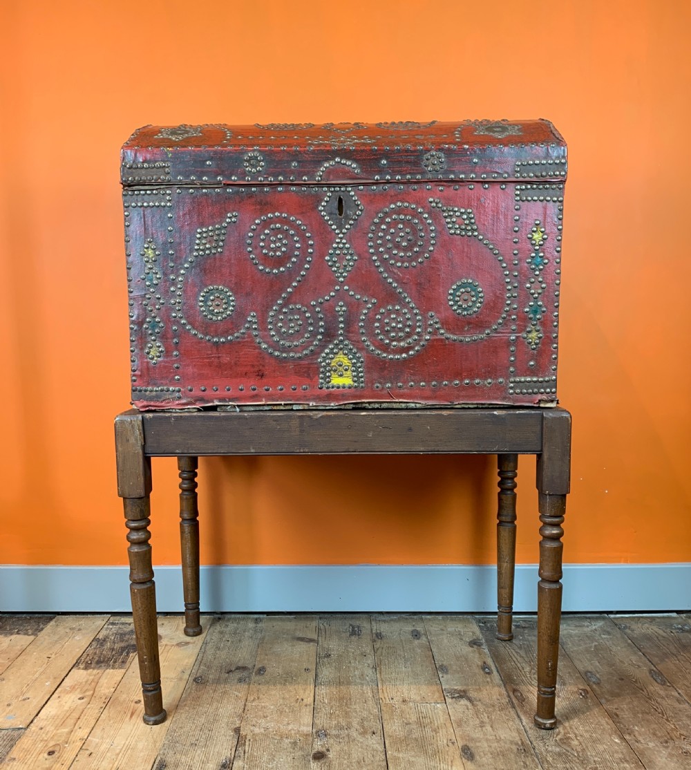 Antique cloth covered carriage trunk with nailed studded decoration View II