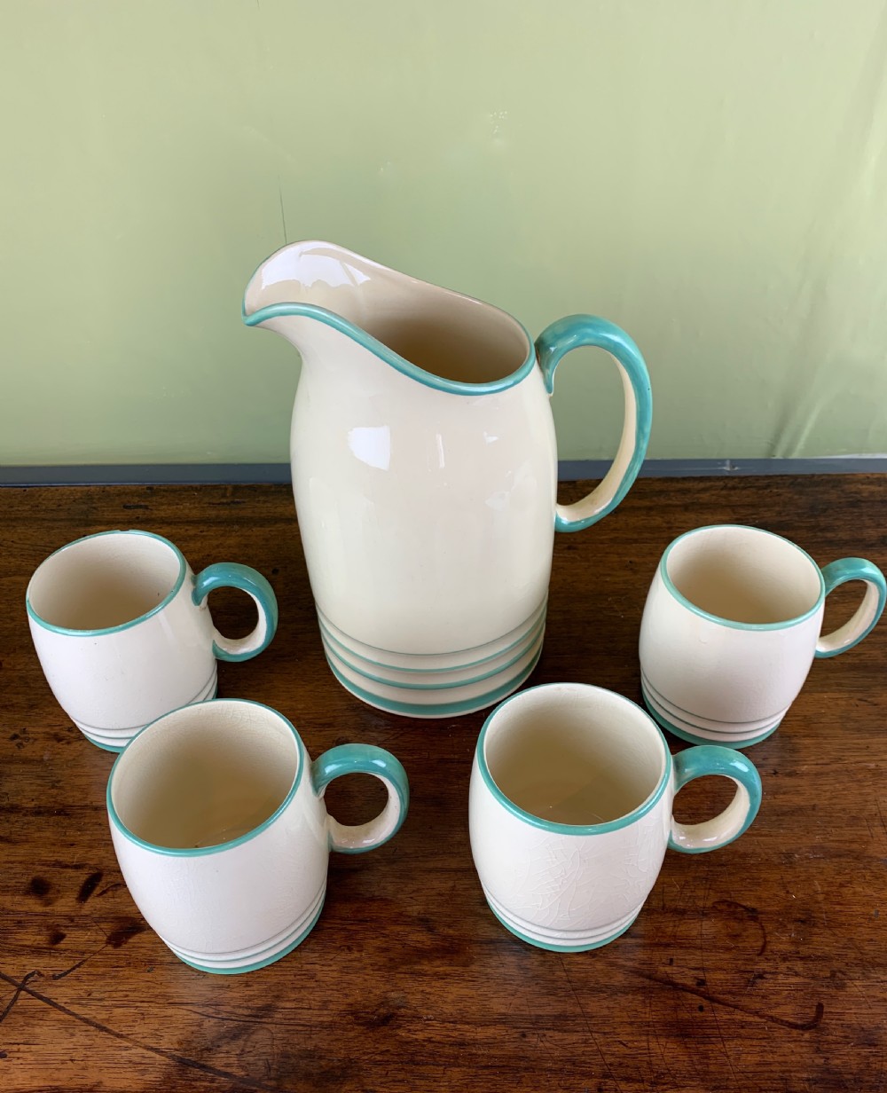 Art Deco Grays Pottery jug and four matching mugs View II