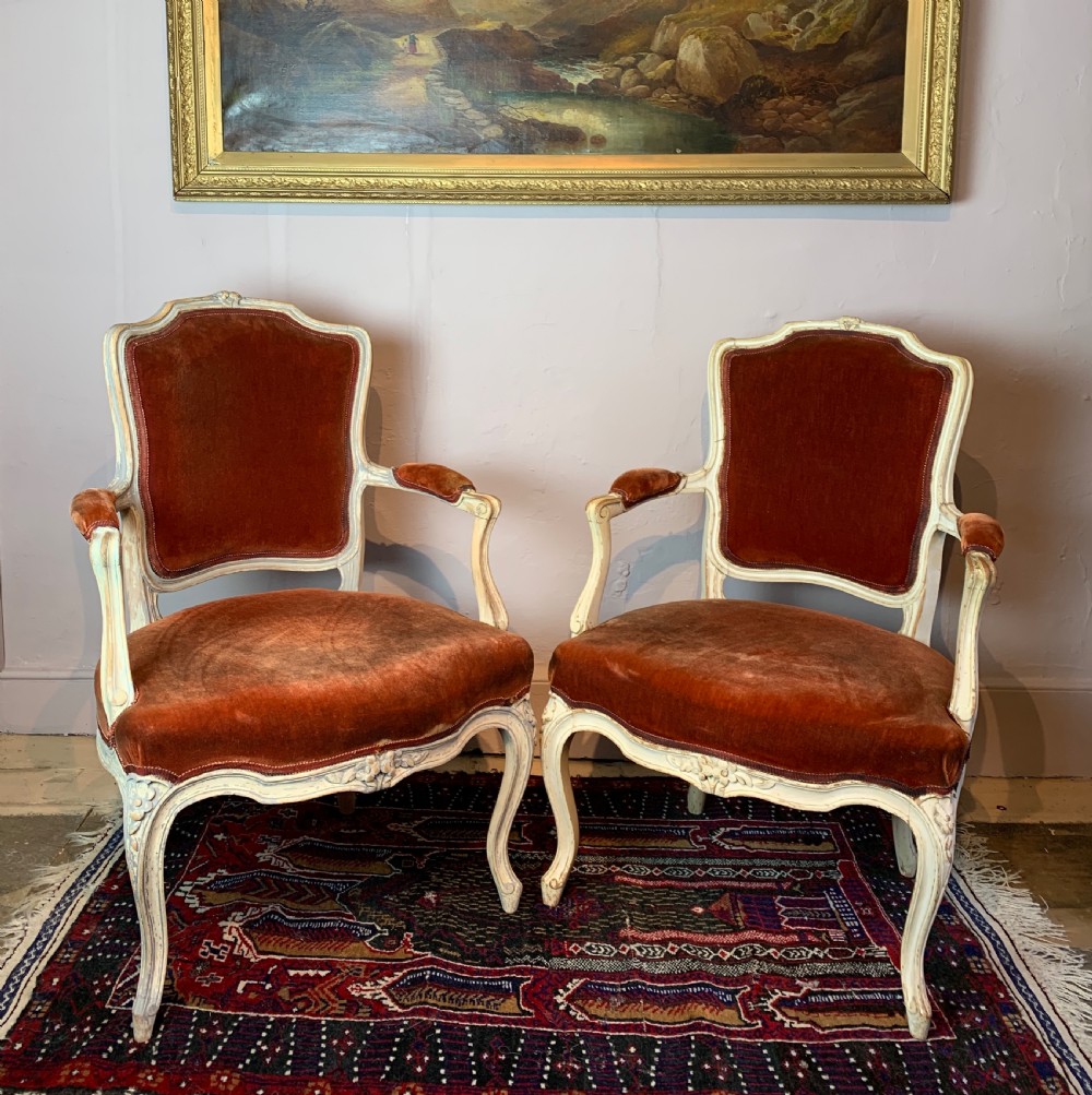 Pair of Antique French painted fauteuils in Louis XVI style with red velvet upholstery
 View II