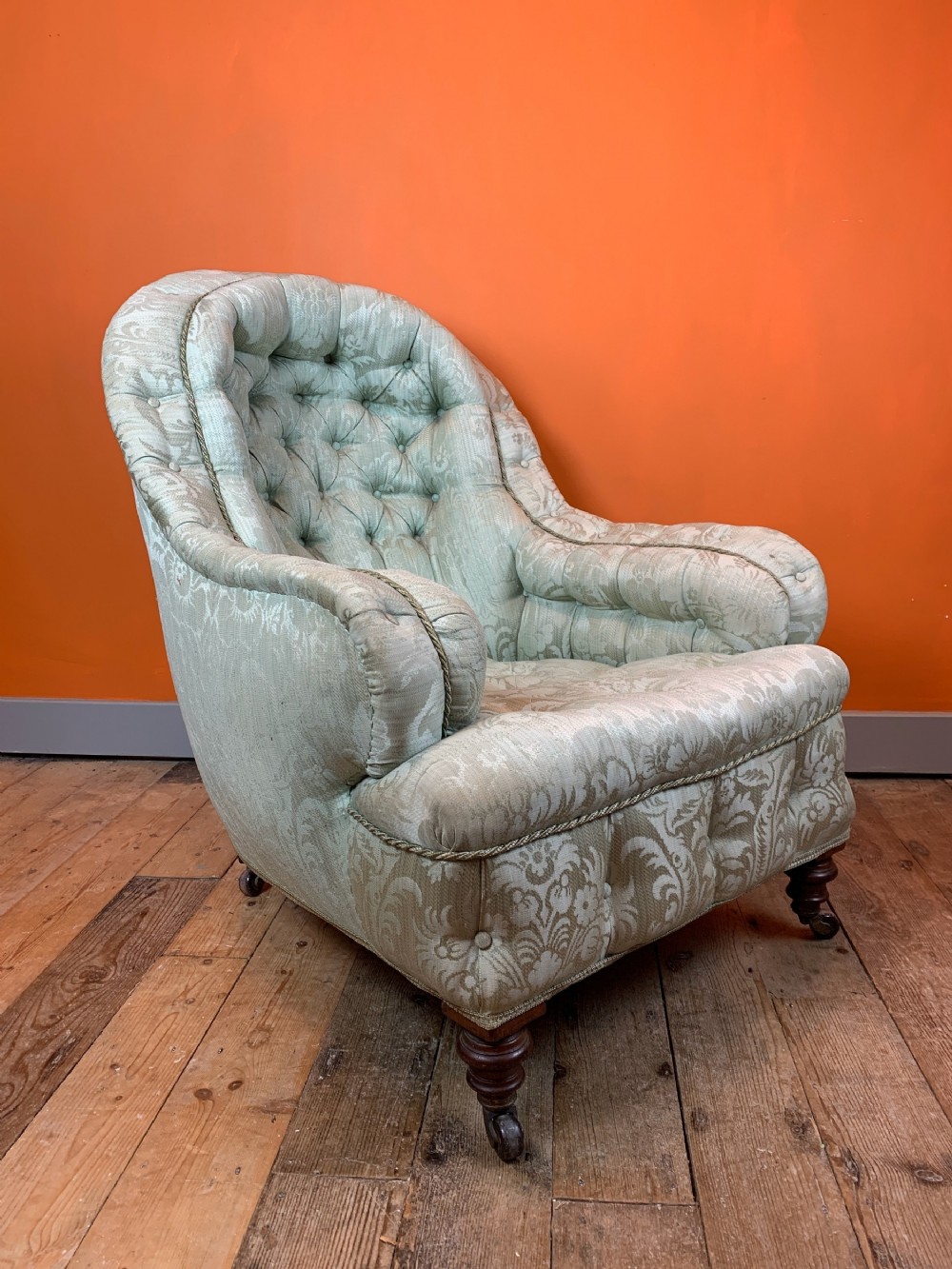Victorian iron framed button back armchair by Cornelius V Smith