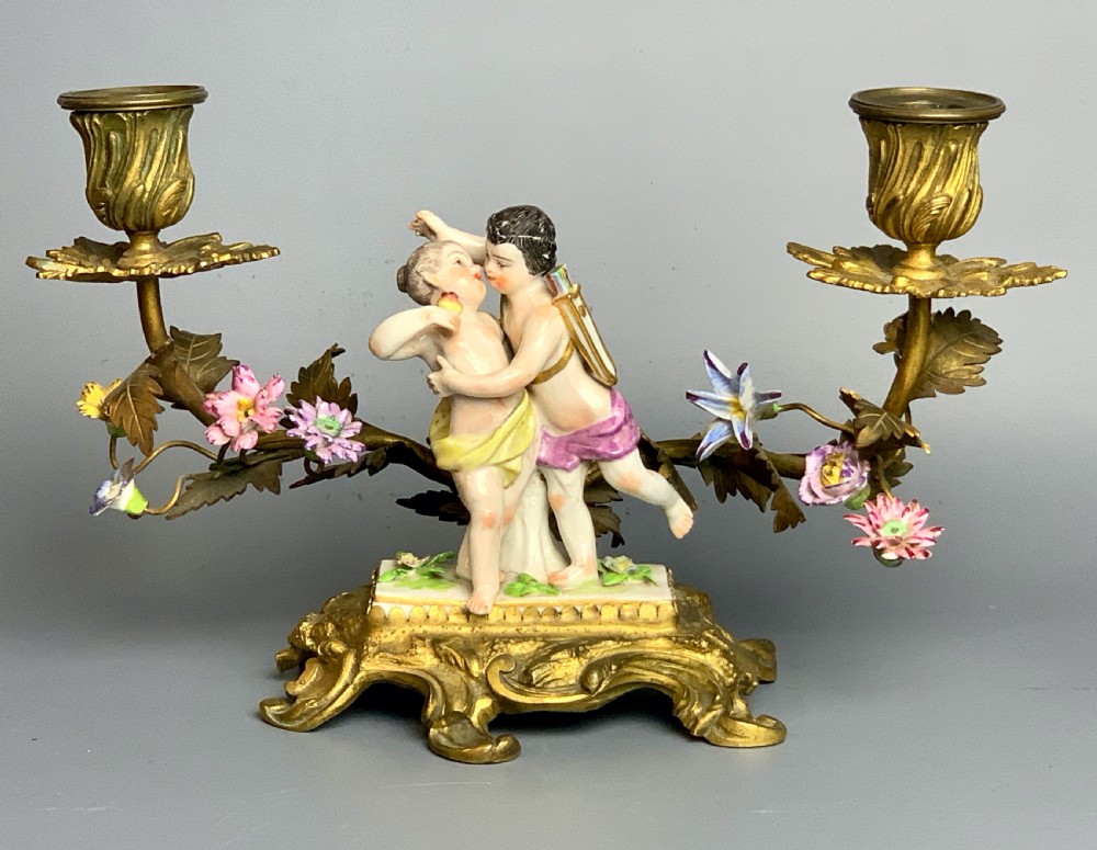 Pair of Continental porcelain ormolu mounted candelabra with cherubs View VII