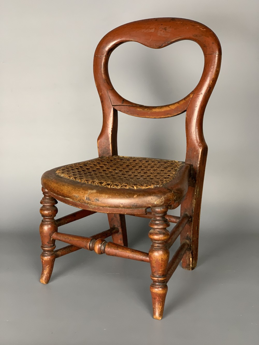 Victorian doll's chair with cane seat