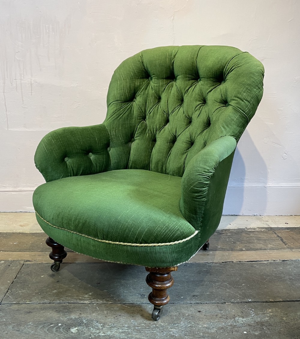 Victorian button back armchair upholstered in green velvet View II