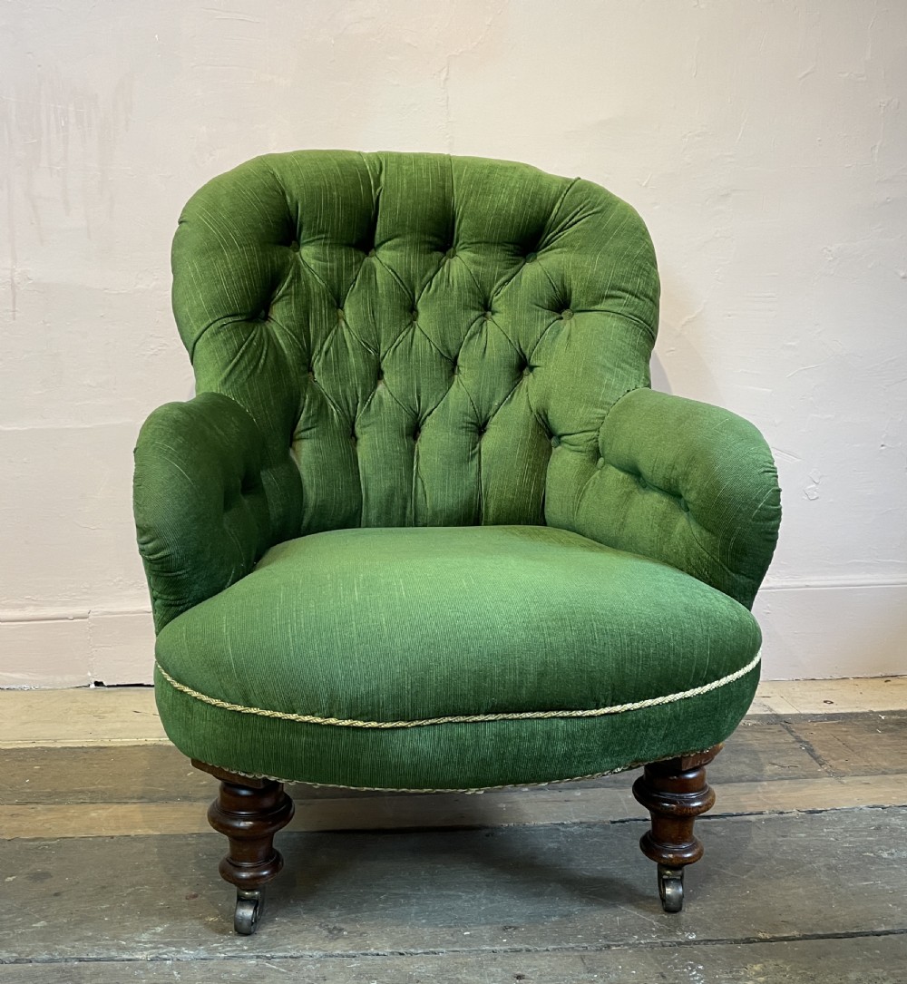 Victorian button back armchair upholstered in green velvet View III