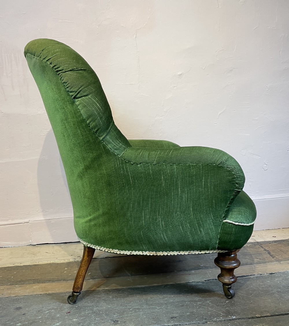 Victorian button back armchair upholstered in green velvet View IV