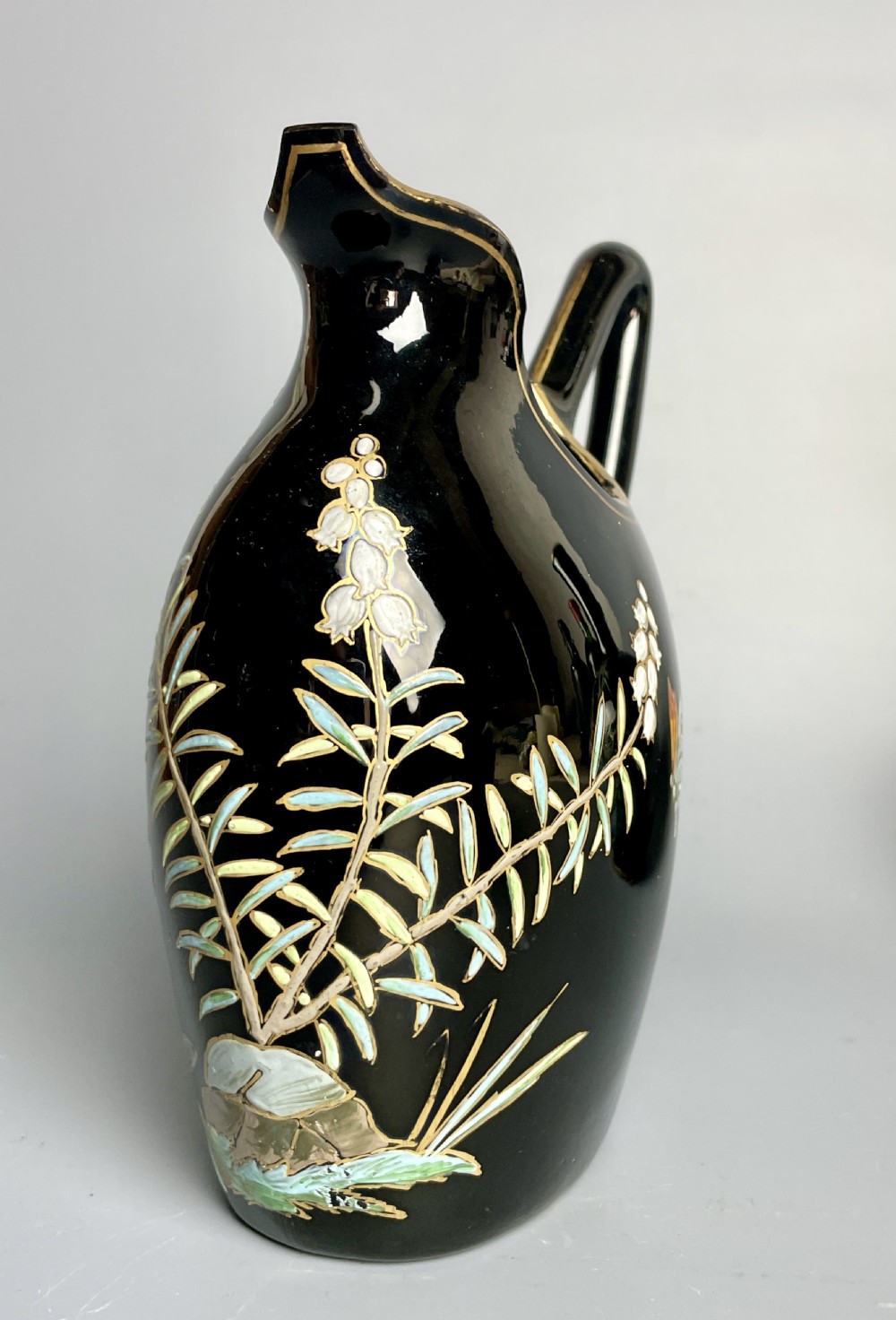 Victorian Dudson Pottery Jackfield jug painted with butterflies View II