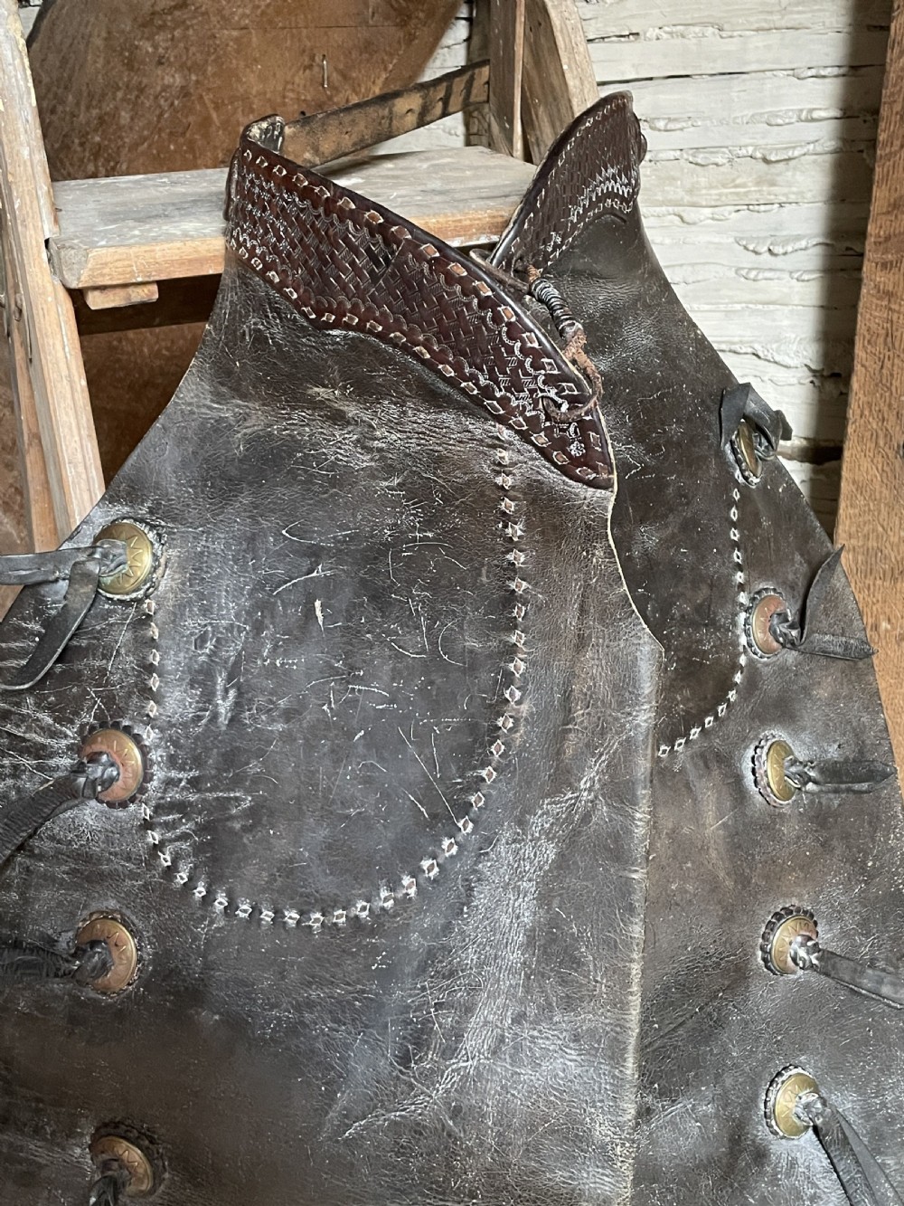 Pair of Leather cowboy batwing chaps from a Montana Ranch View II