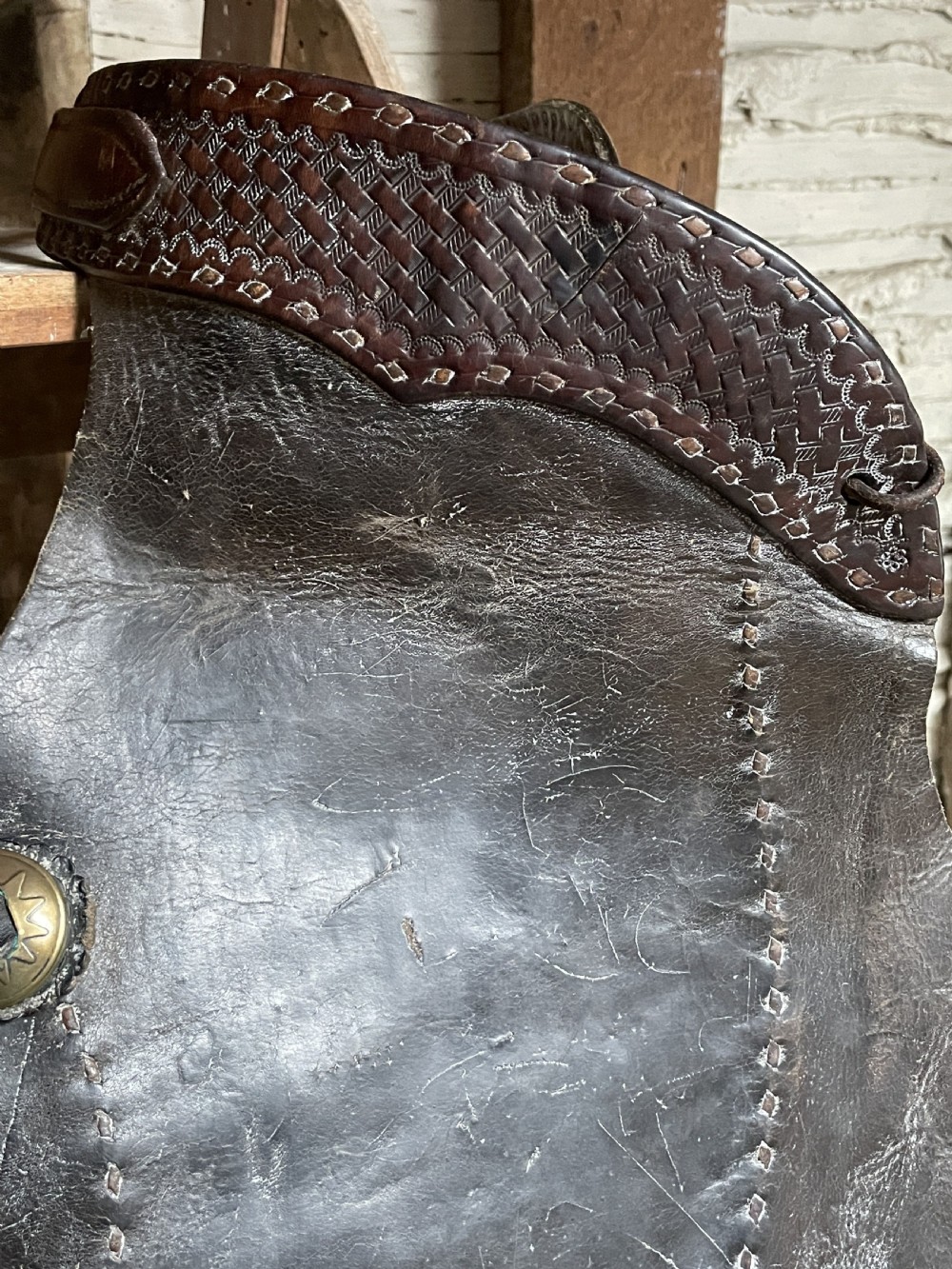 Pair of Leather cowboy batwing chaps from a Montana Ranch View III