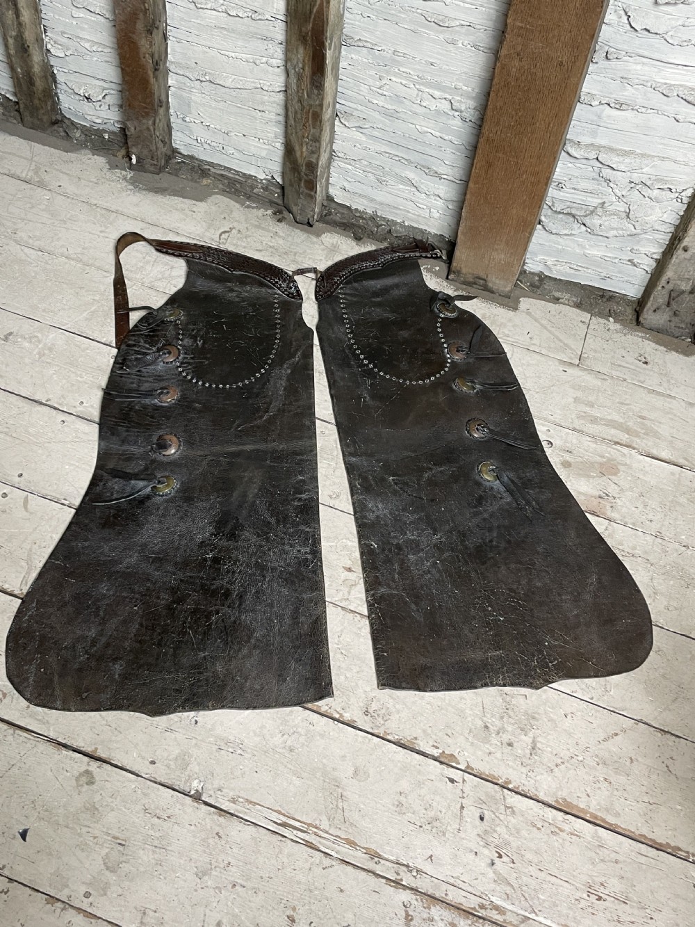 Pair of Leather cowboy batwing chaps from a Montana Ranch View VIII
