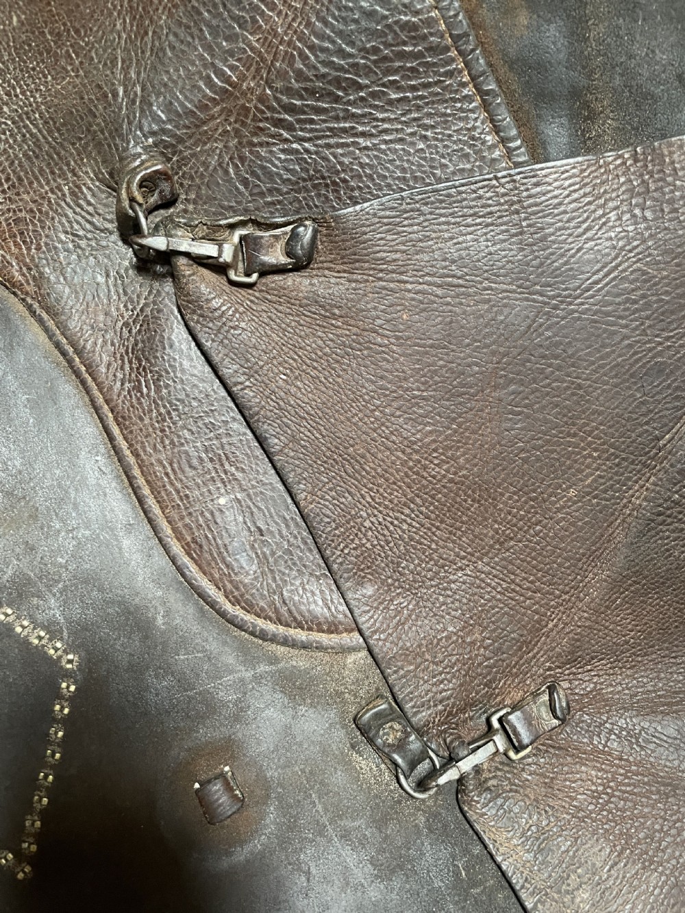 Pair of leather cowboy chaps from a Montana Ranch View V