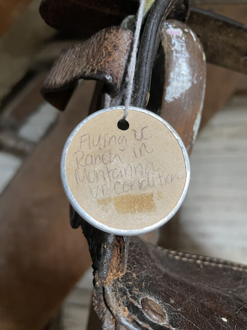 Pair of leather cowboy chaps from a Montana Ranch View VI