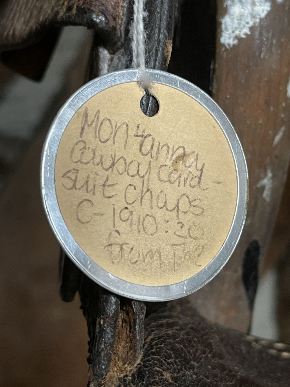 Pair of leather cowboy chaps from a Montana Ranch View VII