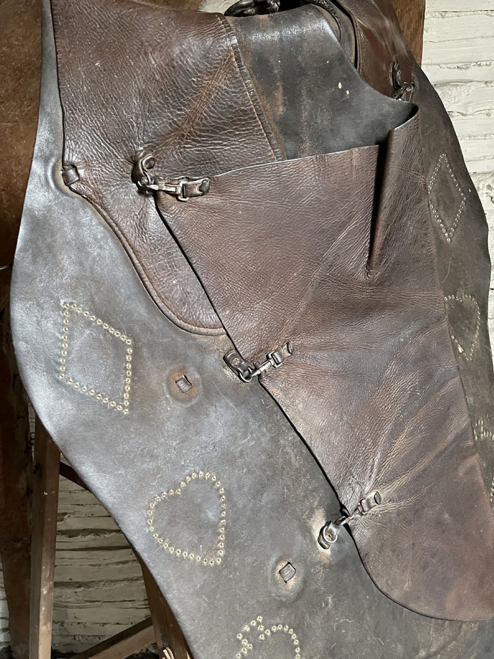 Pair of leather cowboy chaps from a Montana Ranch View VIII