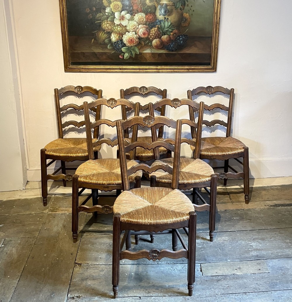 A set of Six French Rush Seated Ladderback Chairs